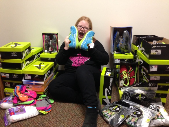 Kamrie donating 37 pairs of shoes and socks to Dover Elementary School